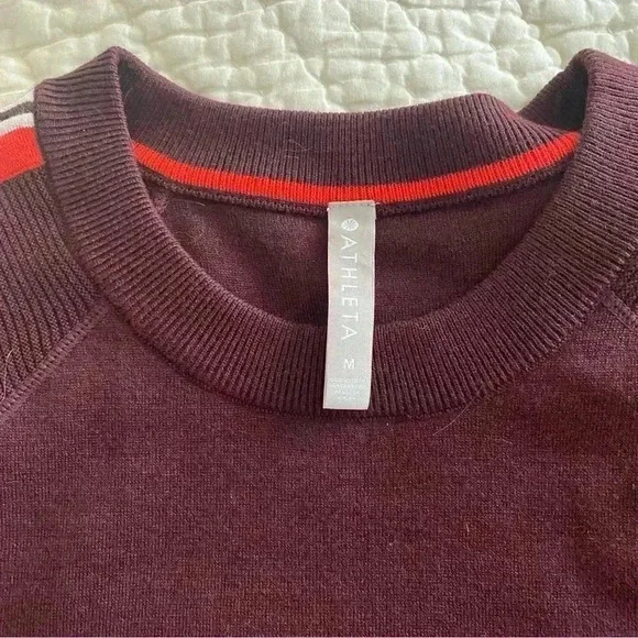 Size m Athleta Burgundy sweater with stripes on the sleeves. - Picture 3 of 6
